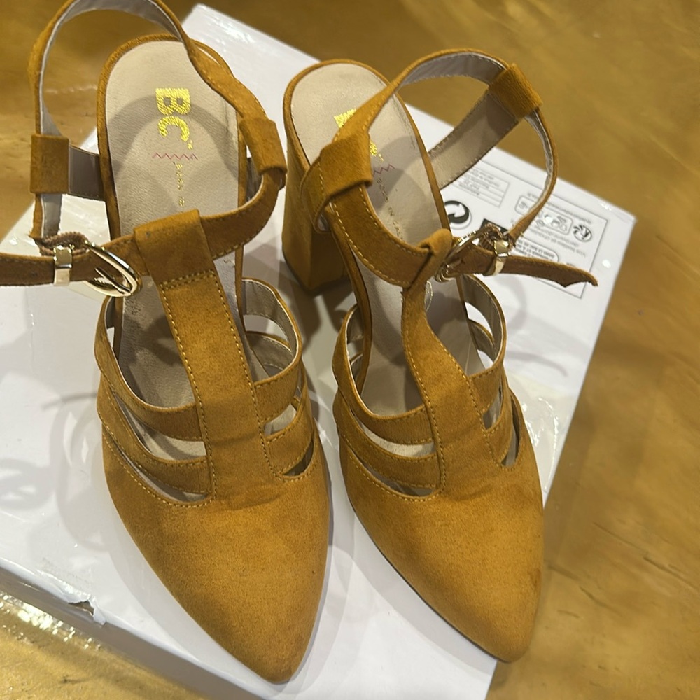 BC  Born in California, beautiful heels with straps and buckle., suede  leather.